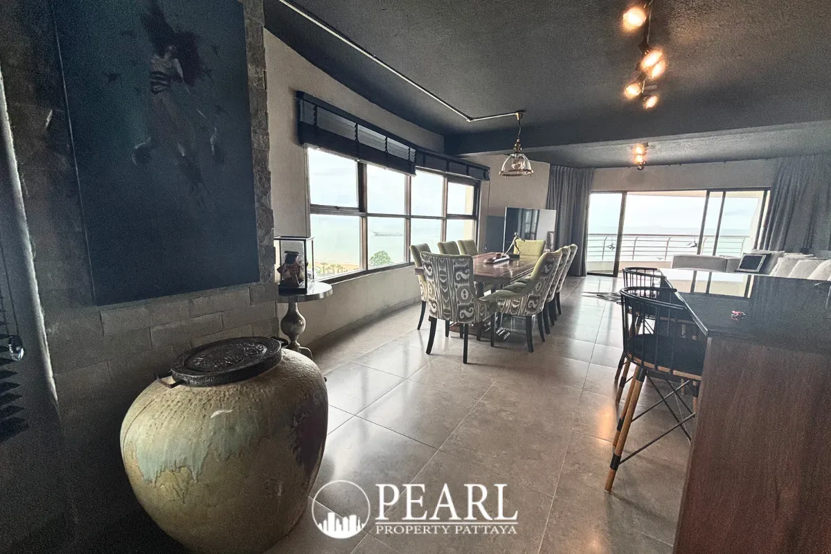 1 Bedroom Condo for Sale in Metro Jomtien Condotel living room with sofa and TV