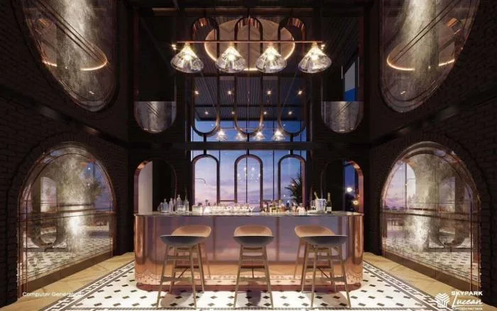 SKYPARK Lucean Jomtien Pattaya 48th floor sky gym with treadmills, weight benches, and large windows.