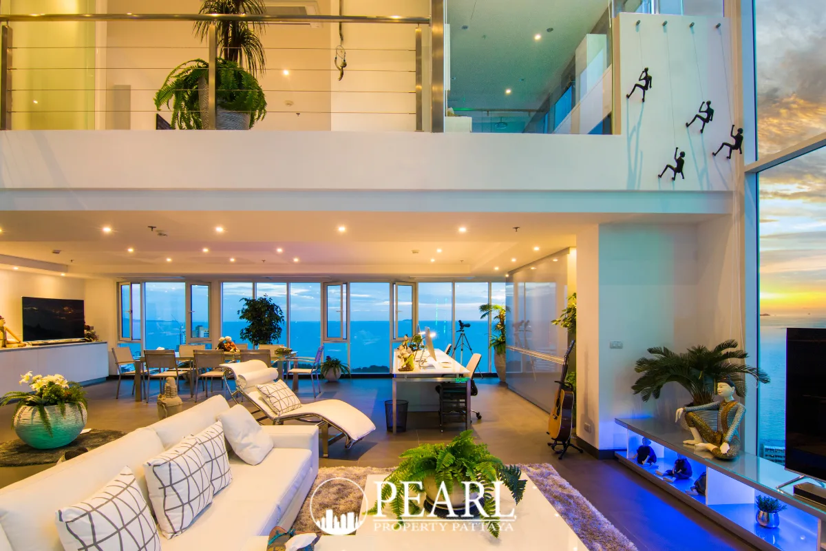 2 Bedroom Condo for Sale in Sky Residences Pattaya master bedroom with king-size bed